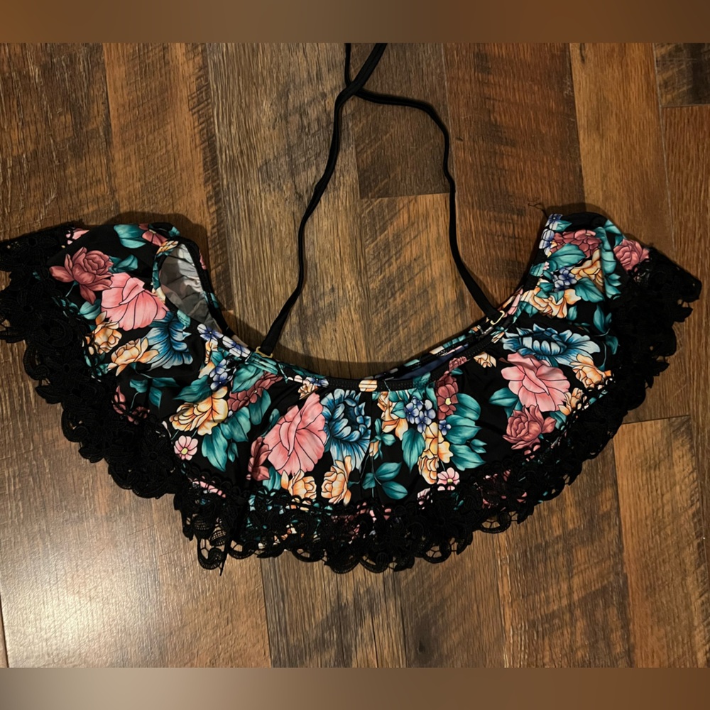 Floral bathing suit top with sleeves and overlay